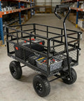 Heavy Duty Steel Dump Cart With 600 Lb Capacity Utility Wagon And Inflatable Ten Inch Tires for yard work in warehouse