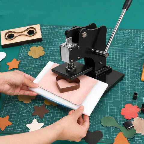 1.5 Ton Leather Die Cutting Machine With 12x9cm Leather Hand Press And Adjustable Pressure Stroke Includes 39 Piece Punch Tool Set For Leathercraft Diy Projects And Cutting Various Materials visible in use with leather.