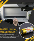 Heavy Duty 23A 12V Alkaline Batteries 5 Pack Runs Forever For Garage Door Openers And Remote Controls in use with a remote and garage door.