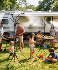Outdoor Patio Misting System With Adjustable Five Point Seven Five Foot Spray Stand Twenty Six Point Five Foot Water Supply Line in use during BBQ