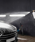 Pressure Washer Short Gun Foam Cannon Kit With One Quarter Inch Quick Connector And Five Nozzle Tips M22 To Fourteen Millimeter Inlet Adapter Up To Two Thousand PSI For Cars Driveways And Patios spraying foam on car