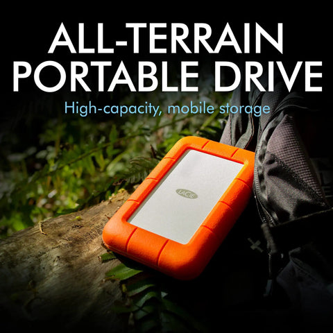 Rugged USB C 4TB Portable External Drive With Drop, Shock, Dust And Rain Resistance for Mac and PC on log outdoors