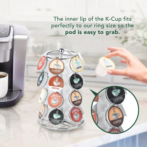 Hand picking a coffee pod from the K Cups Pod Carousel Cup Holder With 24 Slots Spins 360 Degrees Lazy Susan Chrome Finish.