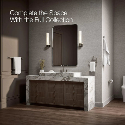 Modern bathroom featuring Purist Pivoting Toilet Paper Holder in Vibrant Polished Nickel with marble sink and mirror.
