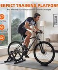 Indoor Bike Trainer Stand With Magnetic Resistance Six Level Adjustable Resistance Bar Remote Control, used by a cyclist inside