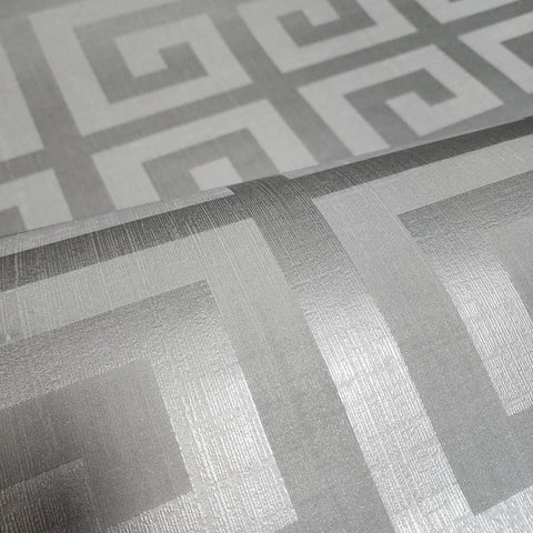 Modern Geometric Greek Key Wallpaper With Metallic Matte Finish Premium Washable Removable Wall Covering For Accent Walls Bathrooms And Basements Double Roll close-up of gray silver pattern