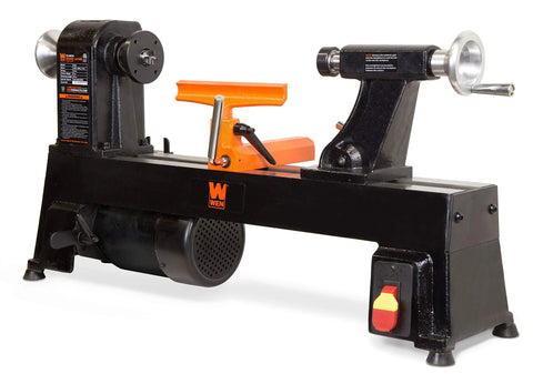 WEN LA3424 12x18 benchtop wood lathe, black with orange tool rest, side view.