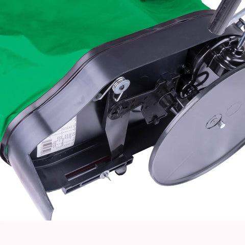 Close-up of Hand Held 25 Pound Bag Seeder Spreader for Lawn Care, showing mechanism and weatherproof 600D nylon bag.