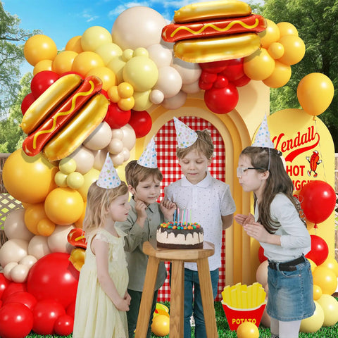 Barbecue Balloon Garland Arch Kit With 176 Pcs Red Yellow White Balloons And Hot Dog Foil Balloons For Picnic Baby Shower Party Decor Easy DIY Arch That Sparks Fun Grillside Celebrations Indoors Or Outdoors with children in party hats.