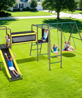 All In One Backyard Swing Set With Slide Crawl Tunnel And Monkey Bars For Kids Aged 3 To 12 Outdoor Metal Playground Set 660 Pound Weight Capacity 5 In 1 Design Sturdy A Frame And Ground Stakes on green lawn