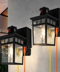 Outdoor Porch Light With Built In GFCI Outlets Dusk To Dawn Motion Sensor Exterior Light Fixture on wall with visible cords