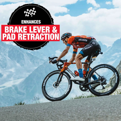 Cyclist riding on mountain road highlighting Bicycle Hydraulic Disc Brake Fluid Mineral Oil Low Viscosity For Crisp Lever Feel