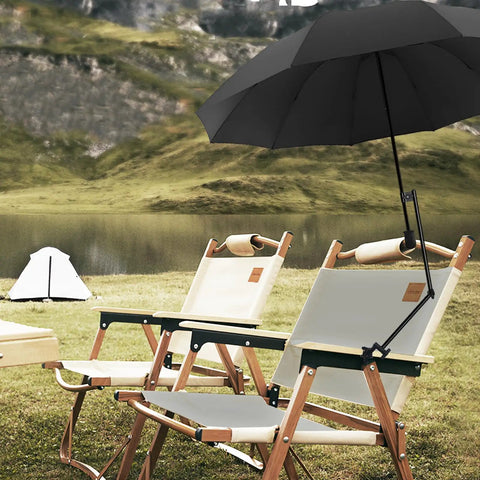 Portable UPF 50 Plus Beach Umbrella With Adjustable Universal Clamp attached to chair by lake