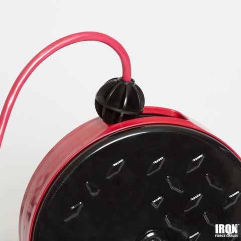 Close-up of red 30 Foot Retractable Extension Cord Reel With Breaker Switch And Three Outlets 16 3 SJTW Yellow Cable.