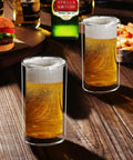 Hella Clear Double Wall Highball Glasses Set Of 2 Badass 13 Oz Thermal Insulated Drinkware For Beer Coffee Juice Smoothies And Cocktails Durable Reusable Barware with beer on a wooden table.