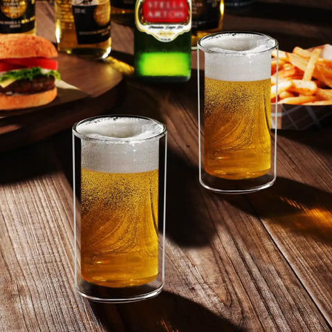Hella Clear Double Wall Highball Glasses Set Of 2 Badass 13 Oz Thermal Insulated Drinkware For Beer Coffee Juice Smoothies And Cocktails Durable Reusable Barware with beer on a wooden table.