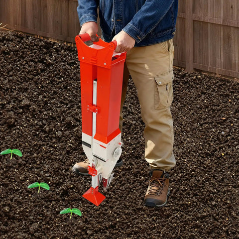 Person using 2 In 1 Seed And Fertilizer Planter For Corn Peanuts And Soybeans Hand Push With Adjustable Depth Manual Sower in garden