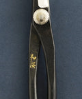 Close-up of Pro Grade Bonsai Tool Kit 4 Piece Set With Yasugi Steel Satsuki Bonsai Scissors, highlighting Japanese craftsmanship detail.