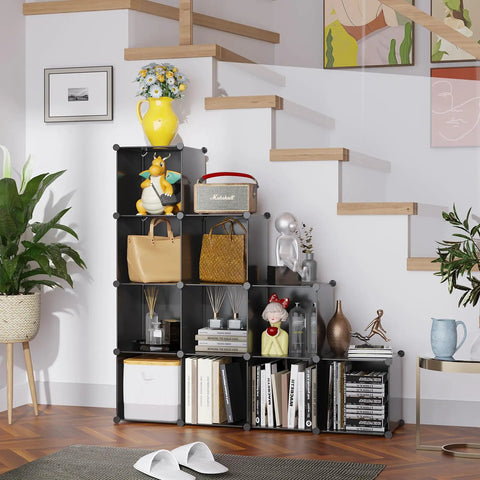 Nine Cube Storage Shelf For Easy Organization, DIY Stackable Bookcase, Plastic Closet Organizer And Modular Shelving Unit For Home Office Or Kids Room, Black Finish 36.6 In L By 12.4 In W By 48.4 In H filled with books and décor items