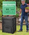 Man standing beside 80 Gallon Outdoor Compost Bin With Top Lid And Bottom Door Aerating Design, Weatherproof PP Plastic.