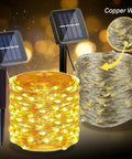 Two Pack 200 LED 66Ft Solar Powered Copper Wire String Lights Outdoor Waterproof With 8 Modes For Garden Patio Yard Parties And Christmas Warm White Weatherproof No Fuss Setup, showing lights coiled with solar panel