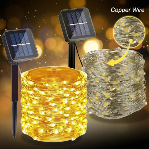 Two Pack 200 LED 66Ft Solar Powered Copper Wire String Lights Outdoor Waterproof With 8 Modes For Garden Patio Yard Parties And Christmas Warm White Weatherproof No Fuss Setup, showing lights coiled with solar panel