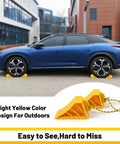 Two Pair Wheel Chocks With Rope And Easy Carry Handle For Travel Trailers Cars Campers Trucks And RVs Non Slip Bright Yellow Lightweight Wheel Chocks For Safe Parking used with blue vehicle on outdoor asphalt