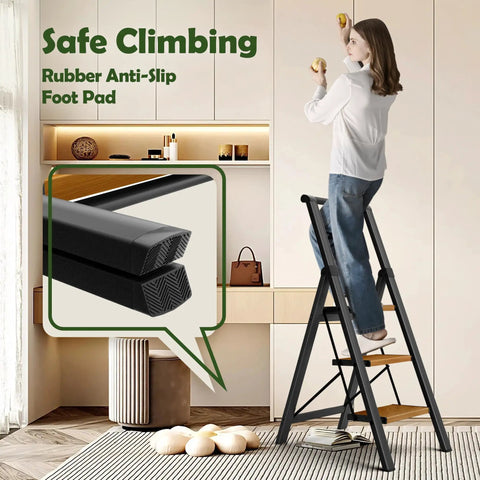 Three Step Foldable Aluminum Ladder With Black Woodgrain Finish, Rubber anti-slip foot pads, woman reaching cabinets in kitchen