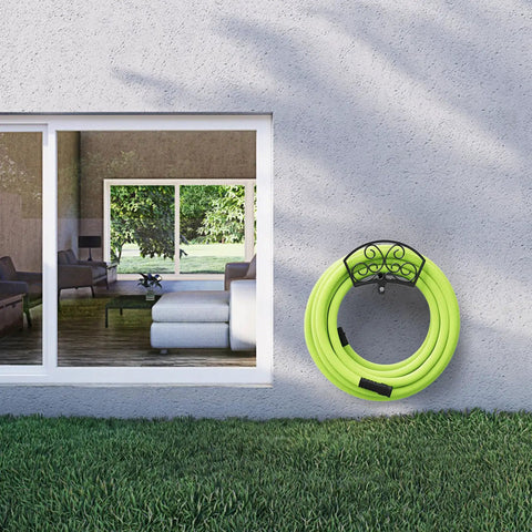 Go-To Garden Hose Holder Wall Mount Rack Holds 125 Feet Of Five Eighth Inch Hose Durable Gauge Steel With Weather Resistant Powder Coat Finish mounted on exterior wall with hose