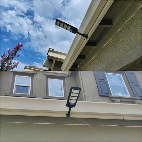 Built Tough Heavy Duty Solar Outdoor Flood Lights With Smart Motion Sensor And Dusk To Dawn Automatic Activation And Ultra Bright IP66 Waterproof Wireless Security Spotlights For Backyard Gate Driveway mounted under eaves.