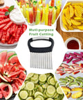 Front view of Suuker large crinkle cutter with black handle and metal blades, surrounded by assorted fruit and veggie slices