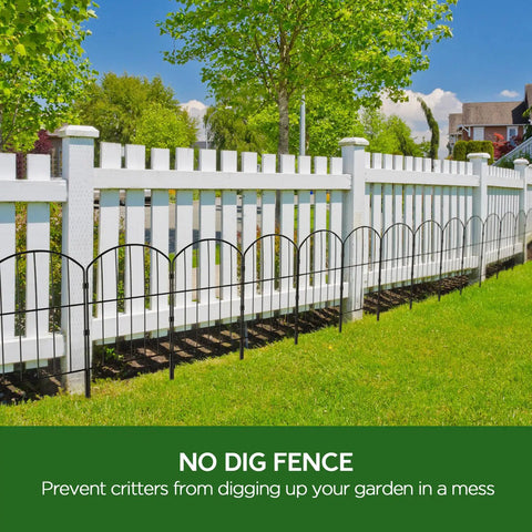 Garden Fence Set No Dig Rustproof Metal Panels, 10 Ft Long By 24 In High Black Fence Barrier in front of white picket fence
