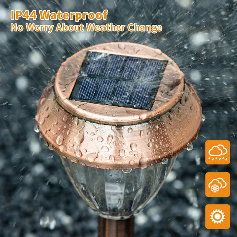 Solar Pathway Lights 6 Pack Outdoor Waterproof Garden Lighting Stainless Steel Walkway Lamps Cold White 15 Lumen LEDs With Up To 12 Hours Of Ultra Bright Night Illumination showing close-up of copper-plated top with raindrops.