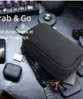 Waterproof Double Layer Travel Cord Organizer Pouch For Electronics Accessories Charger USB Cables Gadgets All In One Storage Bag Black on desk