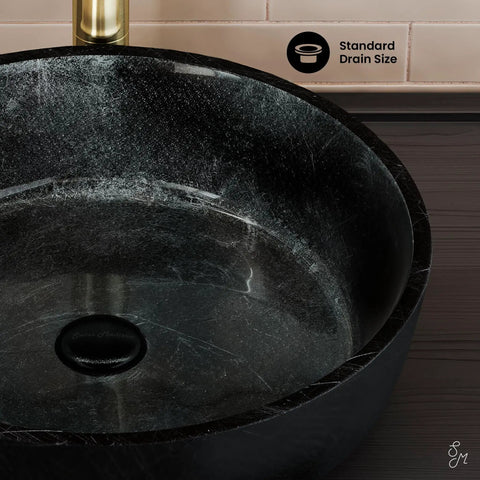 Close-up of Avallon 16.5 Inch Round Glass Vessel Sink in black, showcasing the smooth tempered glass and standard 1.75 inch drain opening.