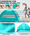 Family Size Beach Sun Shelter With 114 By 82 Inch Extended Mat For 3 To 6 People, UPF 50 Plus UV Protection on beach with canopy open