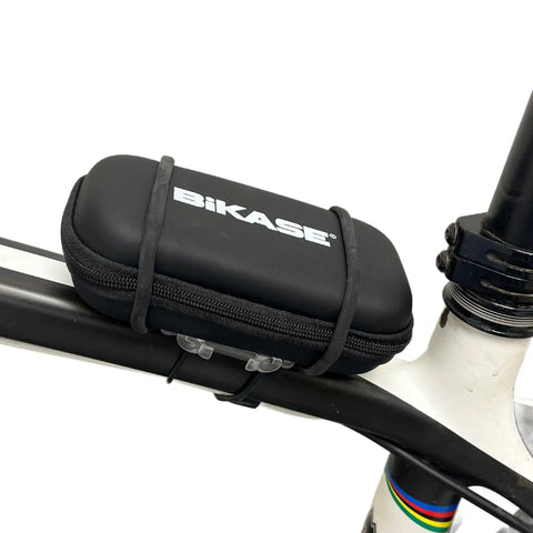 Compact Bicycle Tool Kit With Multi Bit Set mounted on bike with Superband, black case visible.