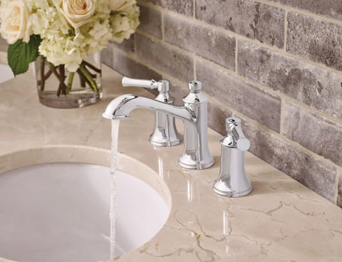 Dartmoor Chrome Traditional Two Handle Widespread Bathroom Sink Faucet Valve Required Fits 8 To 16 Inch Centers With Classic Old School Chrome Finish T6805 shown installed on a marble countertop with water flowing.