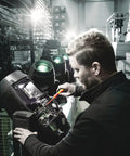 Technician using Kraftform Kompakt VDE 17 Universal 1 Tool Finder, 17 Piece Set with VDE Insulated Screwdrivers on machinery