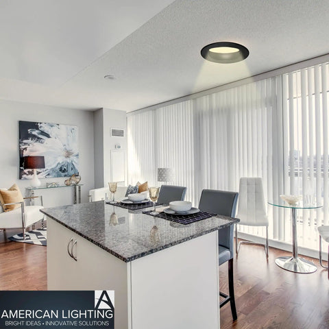 Advantage Select 5 To 6 Inch LED Recessed Downlights Kit illuminating modern kitchen with granite island in residential setting