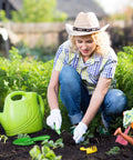 Woman gardening with Four Piece Eight Inch Trowel Set With Colorful Metal Hand Shovels and green watering can