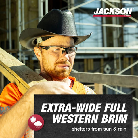 Man wearing Cowboy Style Nonvented Full Brim Hard Hat With 4 Point Ratchet Suspension ANSI Z89.1 Type 1 Class E OSHA Compliant Safety Helmet