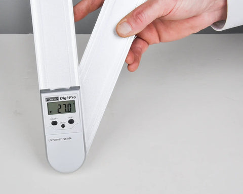 Hand holding Digital Protractor 12 Inch With Magnetic Blades And Hold Zeros For Quick Accurate Angles The Digi Level Pro Delivers Easy