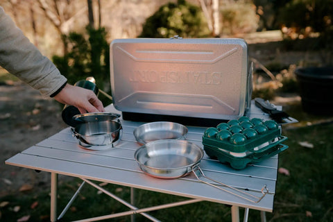 Tough 12-Egg Plastic Carrier With Locking Lid, Molded Handle, And Secure Fit For Camping, Road Trips, And Meal Prep on table