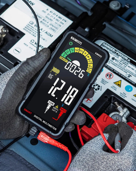 Rechargeable Digital Multimeter With Auto And Manual Range In Smart Auto Mode being used for car battery testing