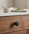 Flat Black Cabinet Knobs 10 Pack Round One And One Quarter Inch Solid Zinc Metal Matte Finish Sleek With Screws Included For Kitchen Cabinets Drawers And Dressers Contemporary Hardware on wooden drawer