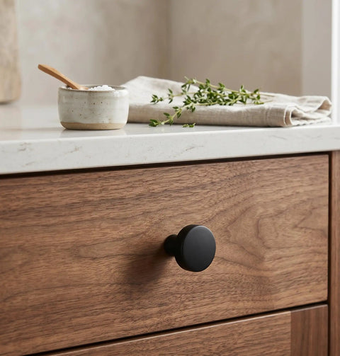 Flat Black Cabinet Knobs 10 Pack Round One And One Quarter Inch Solid Zinc Metal Matte Finish Sleek With Screws Included For Kitchen Cabinets Drawers And Dressers Contemporary Hardware on wooden drawer