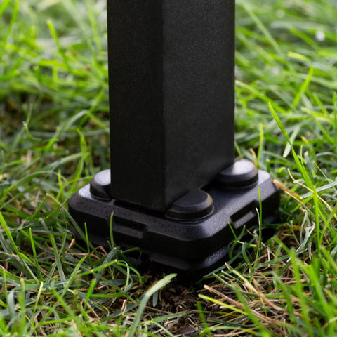 Quarter Inch Griddle Leveling Shims Kit Four Pack Leveler Tool stabilizing grill leg on grass