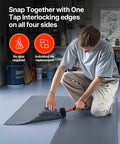 Interlocking Garage Floor Tiles 16 Pack, Diamond Plate Texture Non Slip PVC Floor Mats, 20.2x20.2x0.2 Inches, Graphite Gray, Quiet, Durable, DIY Friendly, Easy Install for Garages, Workshops, and Warehouses. Man installing graphite gray PVC garage floor tile with mallet