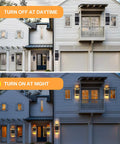 Two Pack Dusk To Dawn Outdoor Wall Lights Up And Down Sconce Black Aluminum Waterproof Exterior Porch Lights 3000K Warm White No Fuss Auto On Off Sensor For House Doorways on house facade, showing daytime off and nighttime on functionality, highlighting automatic sensor operation.